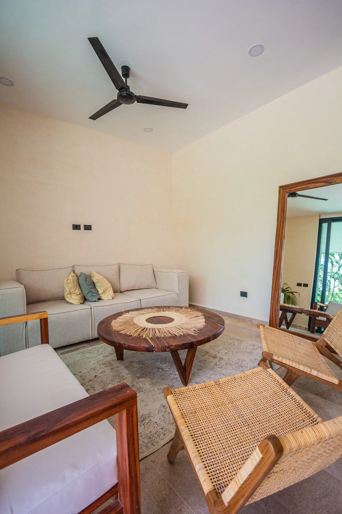 View of Living Room at Habaneros, showcasing Bohemian Decor, Natural Light.