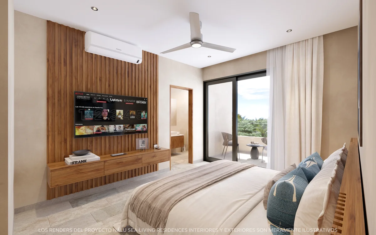 View of Modern Bedroom at Nalu Sea Living, showcasing Wood Accent Wall, Ensuite Bathroom.