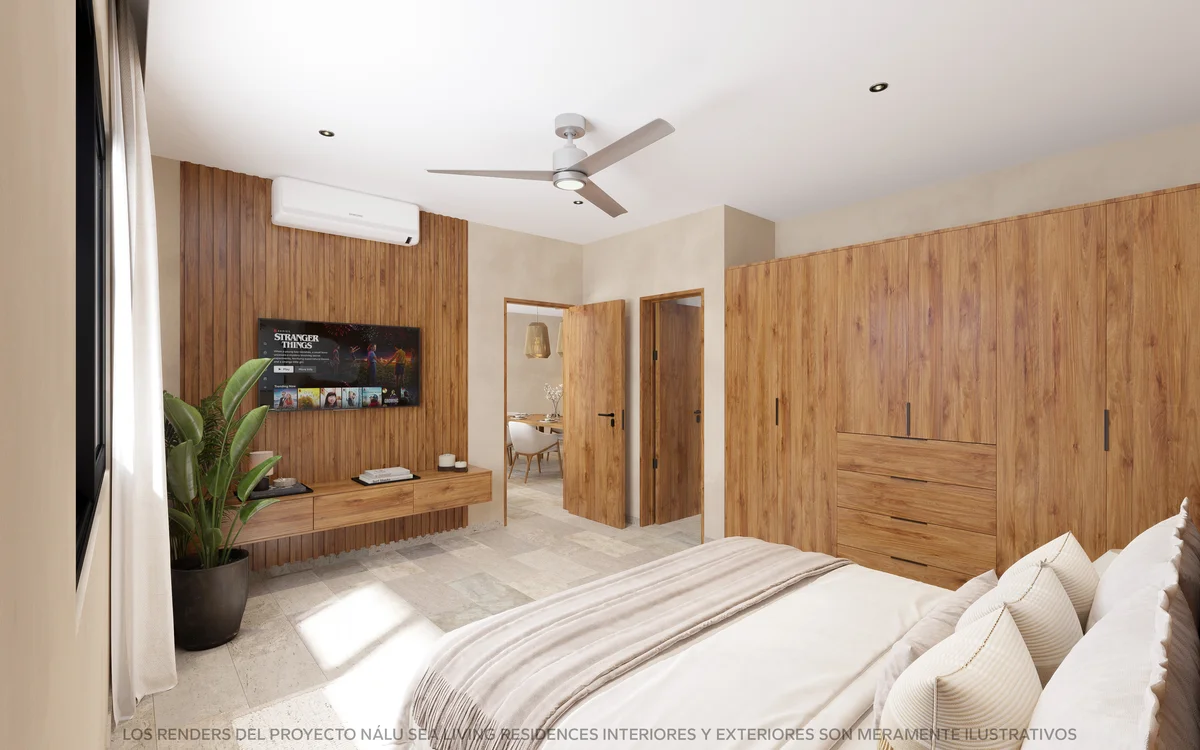 View of Modern Bedroom at Nalu Sea Living, showcasing Wood Accent Wall, Built-in Wardrobe.