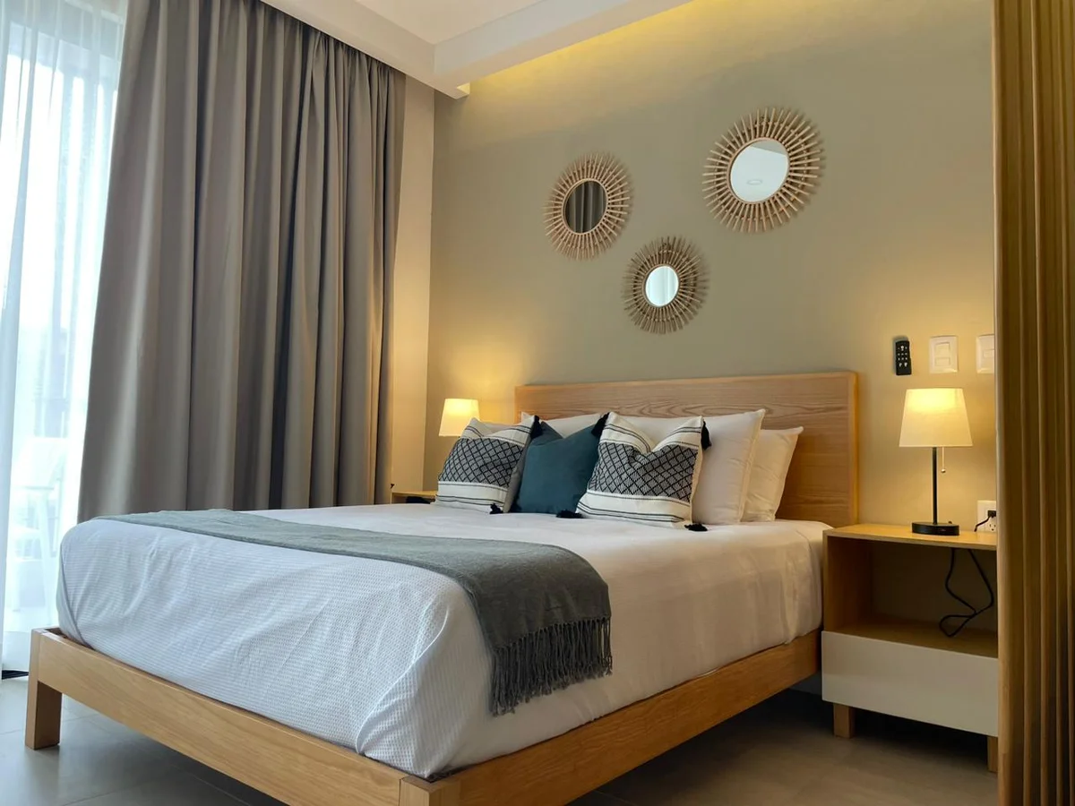 View of Bedroom at Levitat 20, showcasing Modern Decor, Wood Bed Frame.