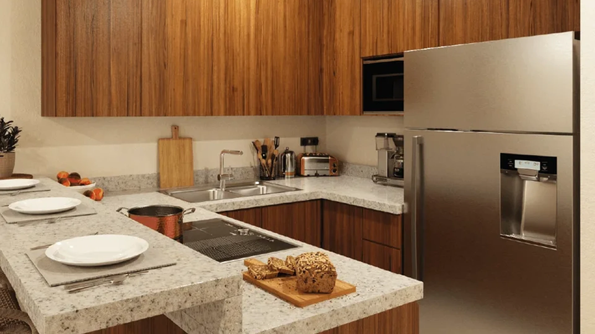 View of Modern Kitchen at Nala, showcasing Wood Cabinetry, Granite Countertops.