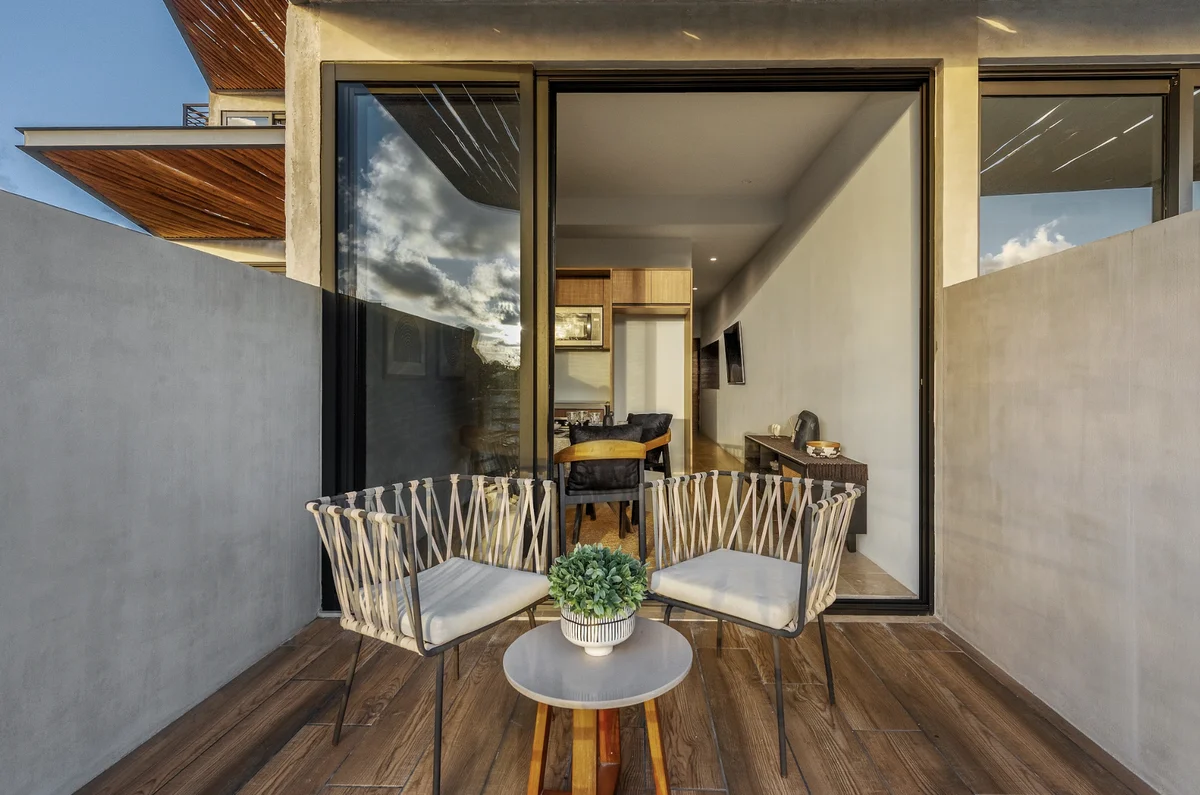View of Private Balcony at BeUTiful, showcasing Modern Apartment, Indoor-Outdoor Living.