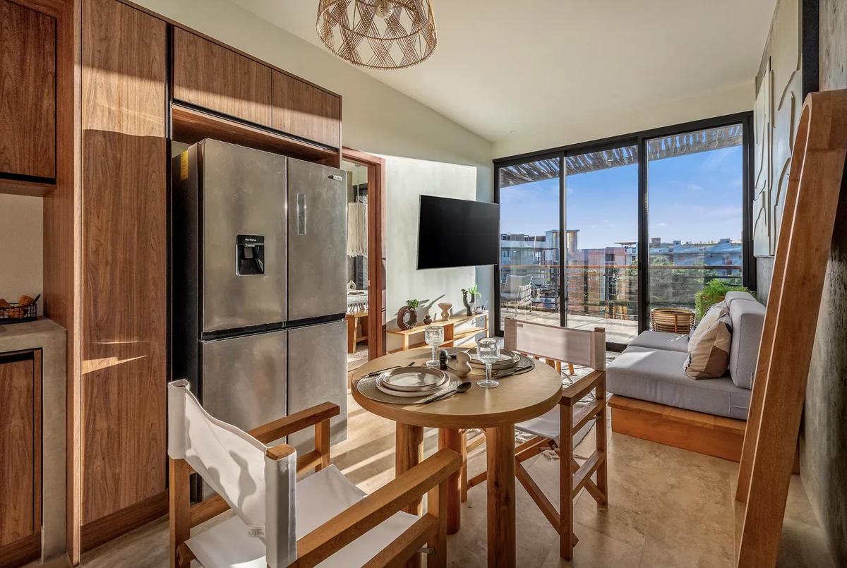 View of Open Concept Living at BeUTiful, showcasing Modern Apartment, Wood Cabinetry.