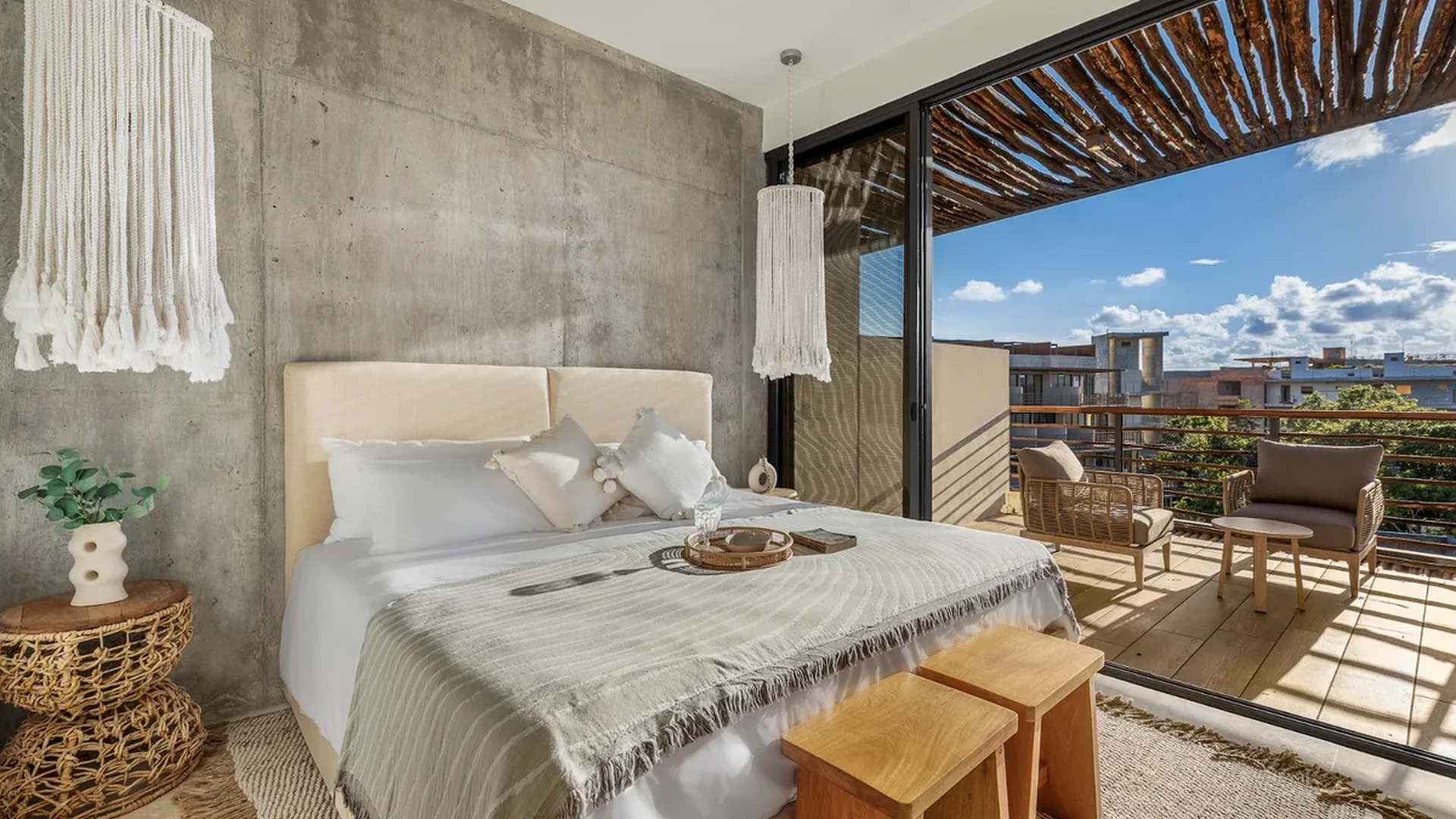 View of Modern Bedroom at BeUTiful, showcasing Private Balcony, Concrete Wall Decor.