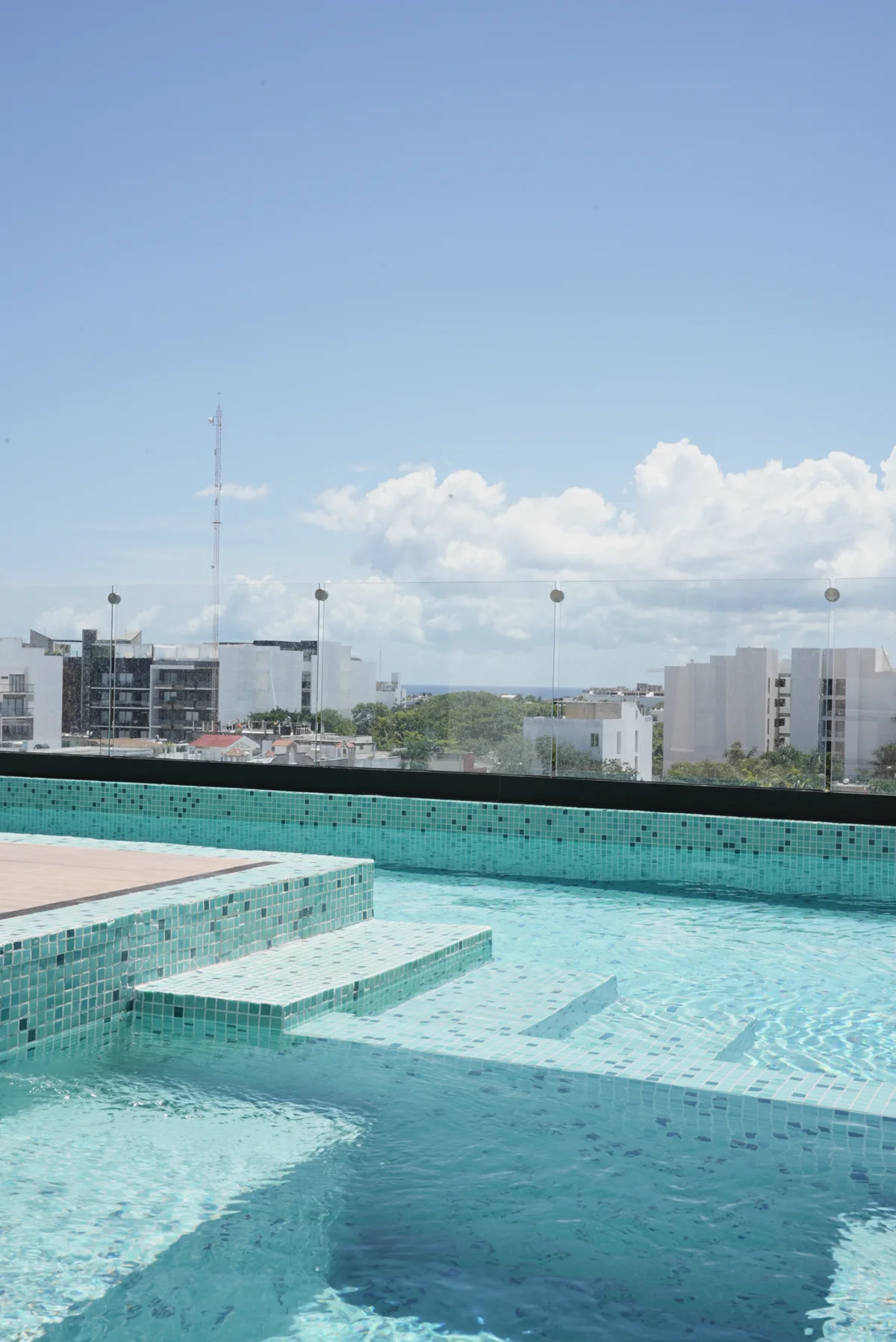 Image of Swimming Pool at Akasha, featuring Rooftop Pool, City View.