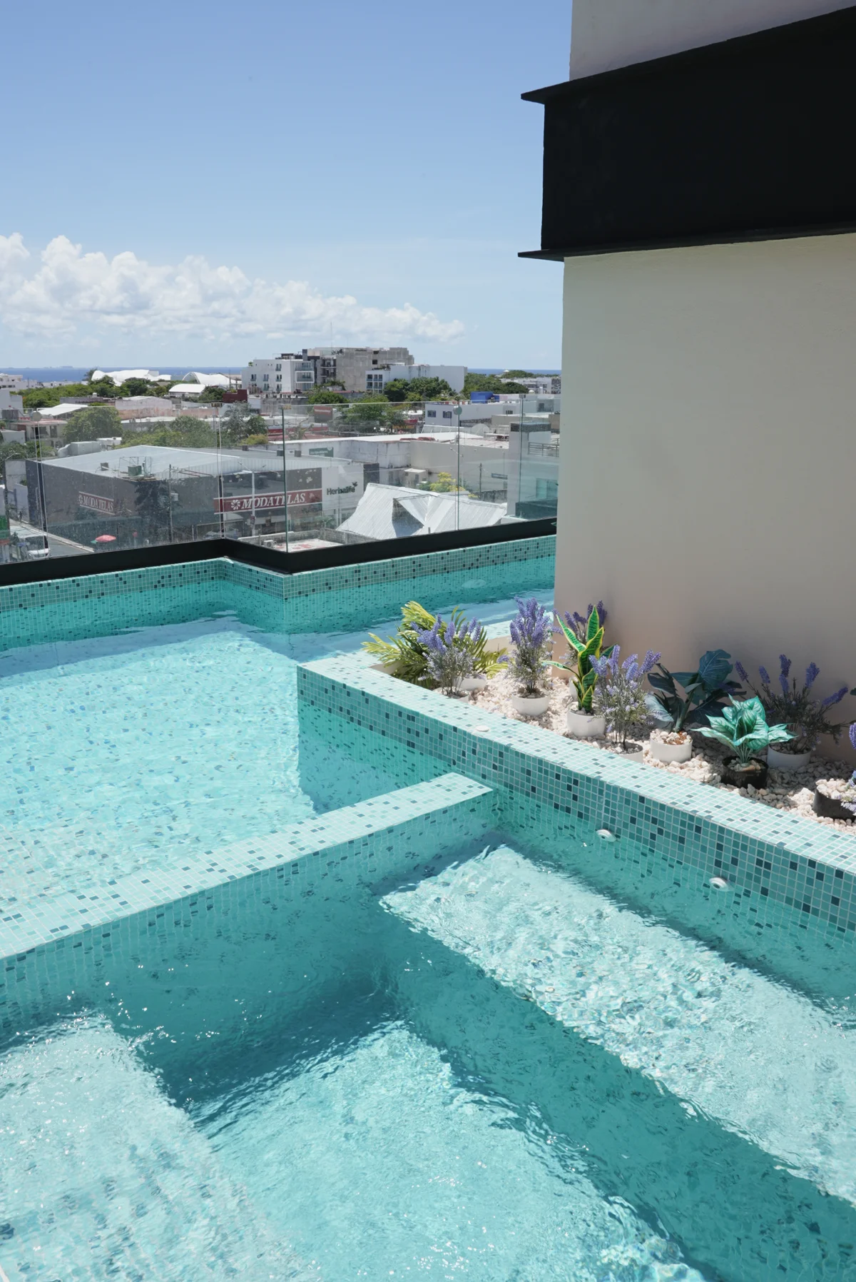 Image of Swimming Pool at Akasha, featuring Rooftop Pool, City View.
