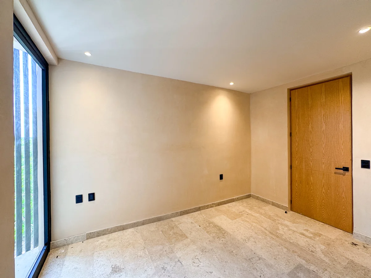 View of Unfurnished Room at Oniric, showcasing Modern Interior, Natural Stone Flooring.