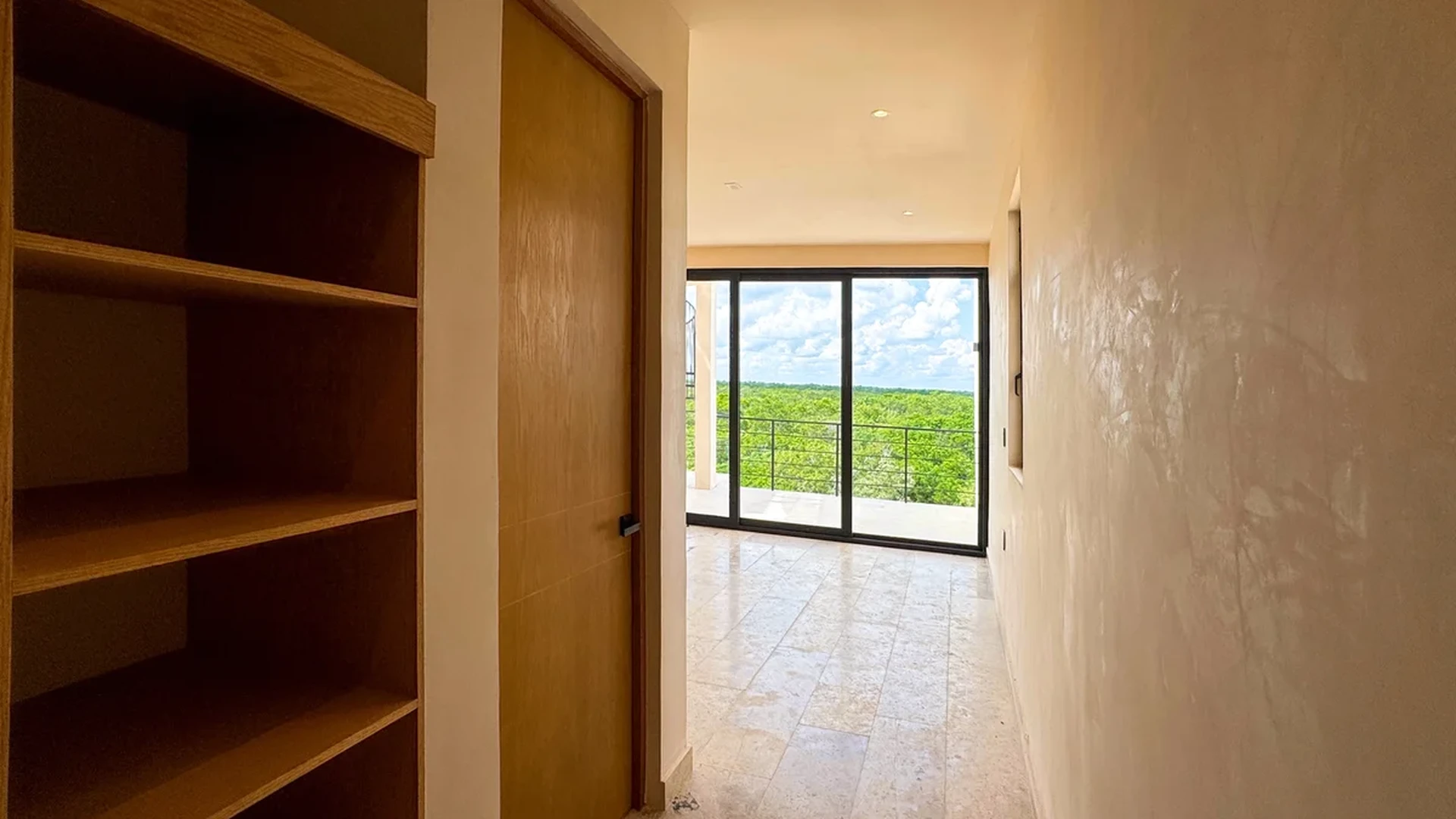 View of Interior Hallway at Oniric, showcasing Jungle View, Natural Light.