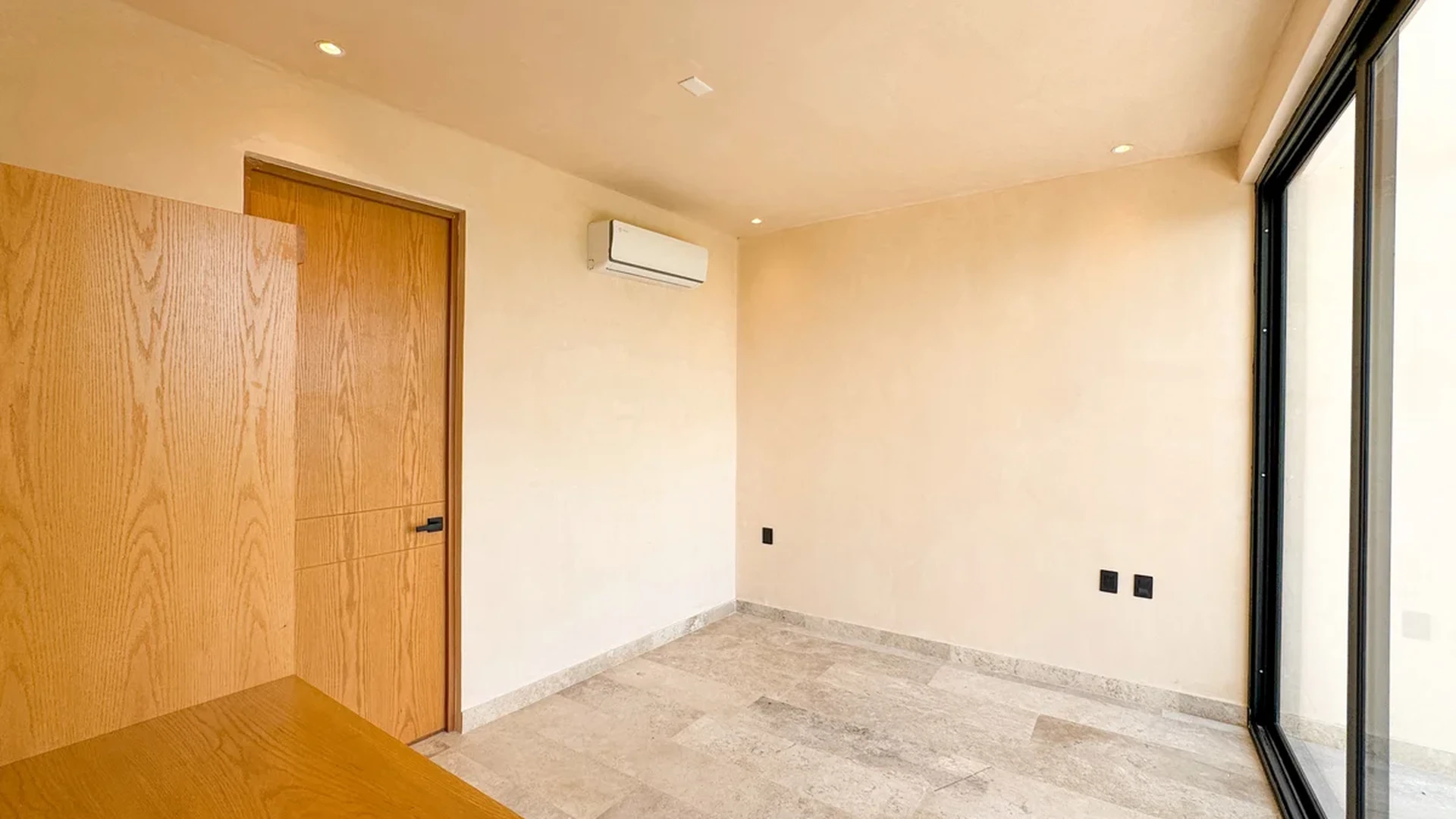 View of Bedroom at Oniric, showcasing Tile Flooring, Natural Light.