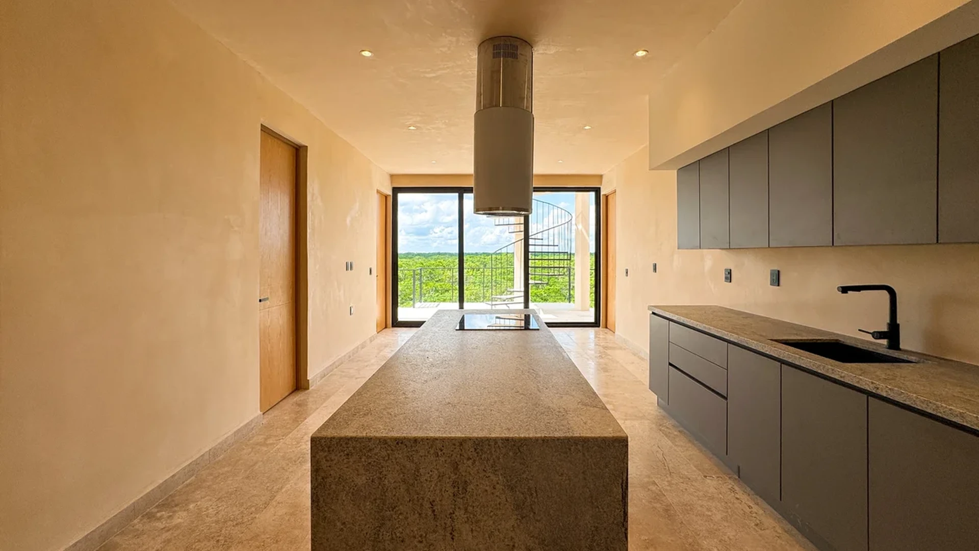 View of Modern Kitchen at Oniric, showcasing Kitchen Island, Stone Countertops.