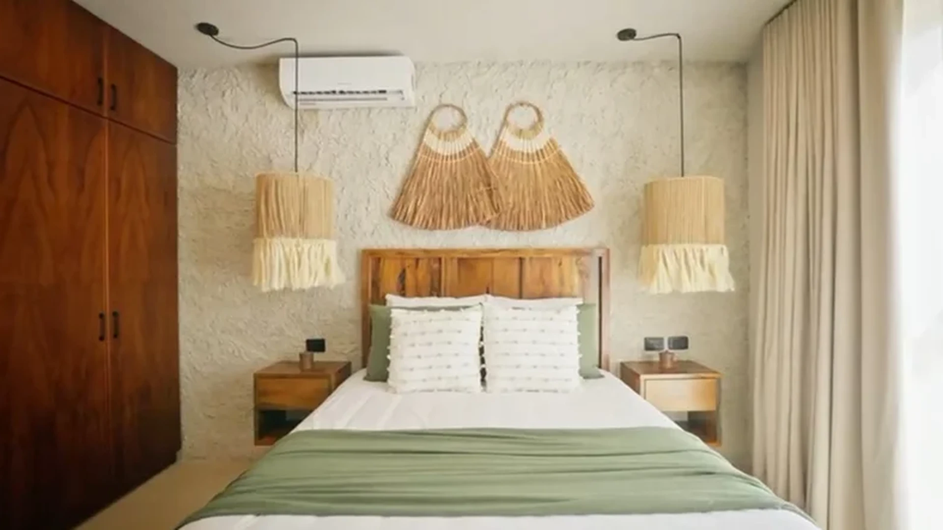 View of Bedroom at Tamarindos, showcasing Bohemian Decor, Wooden Furniture.
