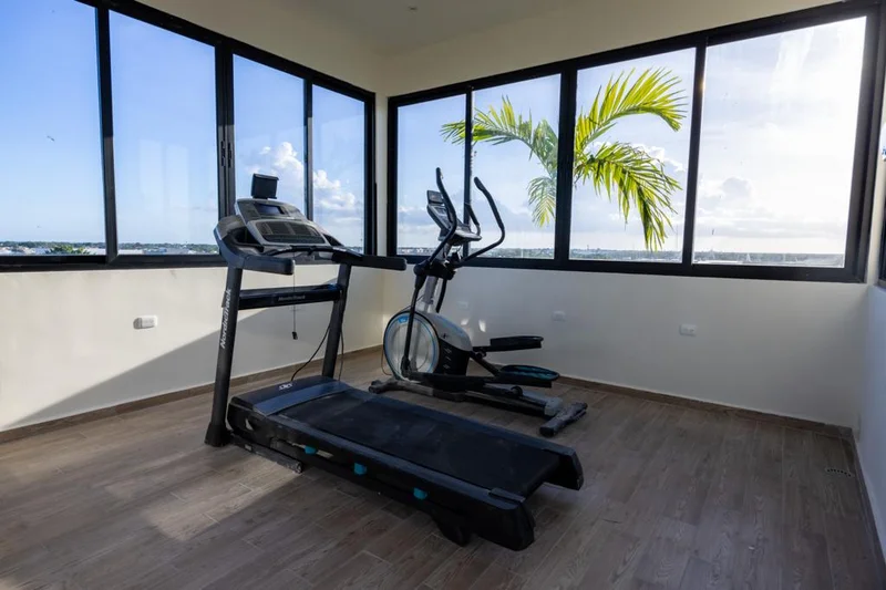 Image of Gym at Mya Black Diamond, featuring Gym, Fitness Center.