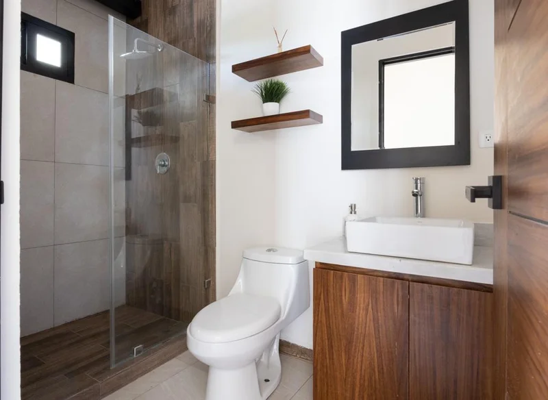 View of Modern Bathroom at Mya Black Diamond, showcasing Walk-in Shower, Glass Shower Door.