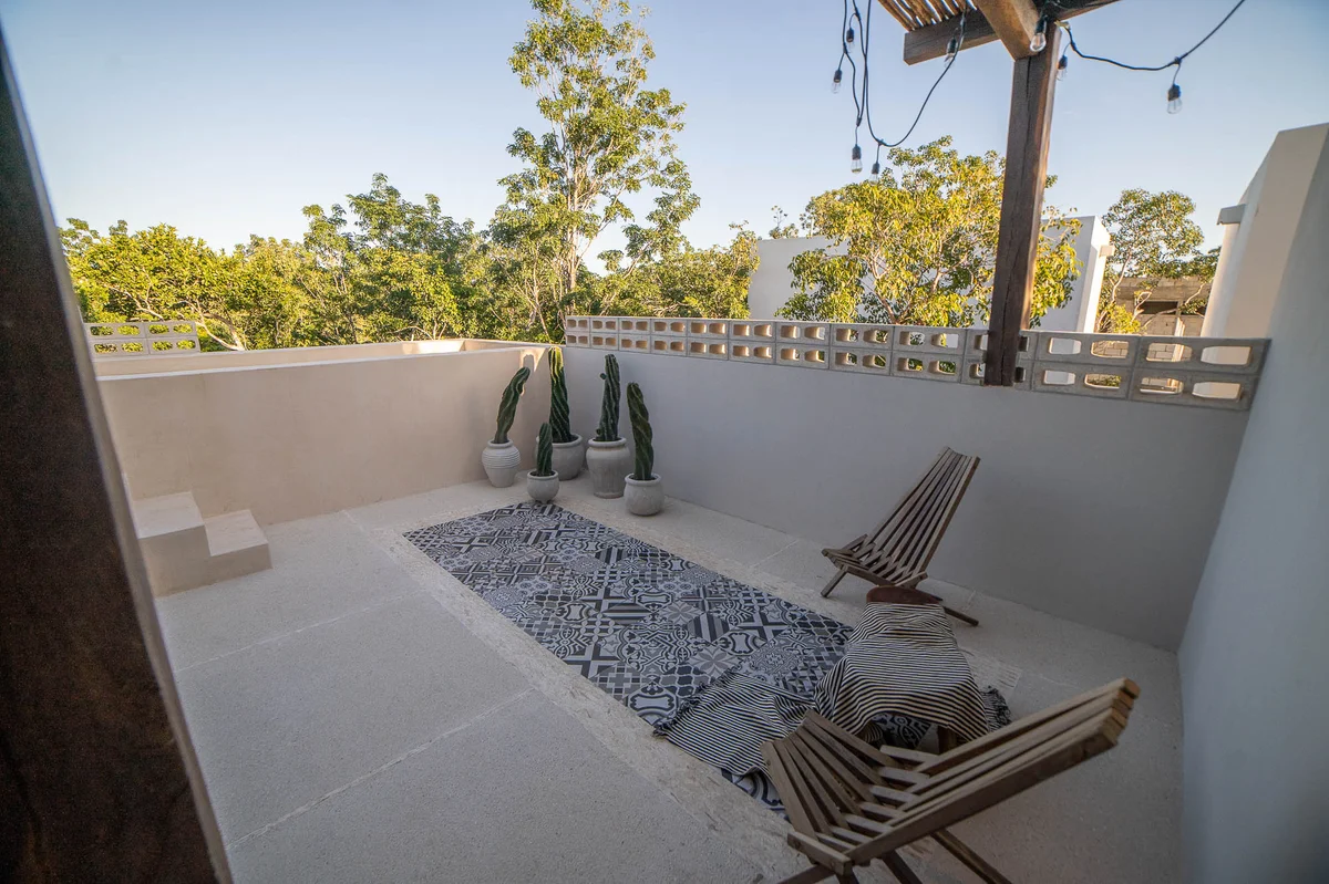 Image of Rooftop Terrace at Attha Holistika, featuring Rooftop Terrace, Outdoor Lounge.