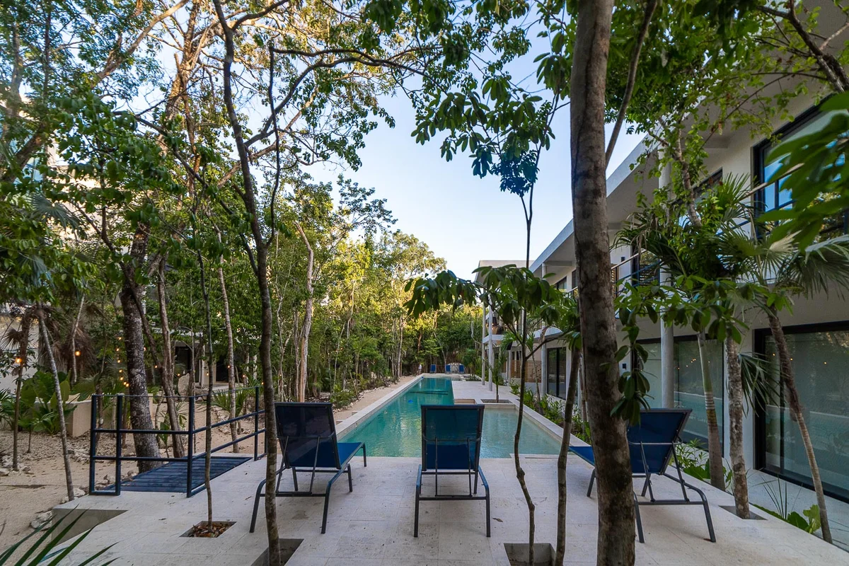 Image of Swimming Pool at Attha Holistika, featuring Swimming Pool, Jungle Setting.