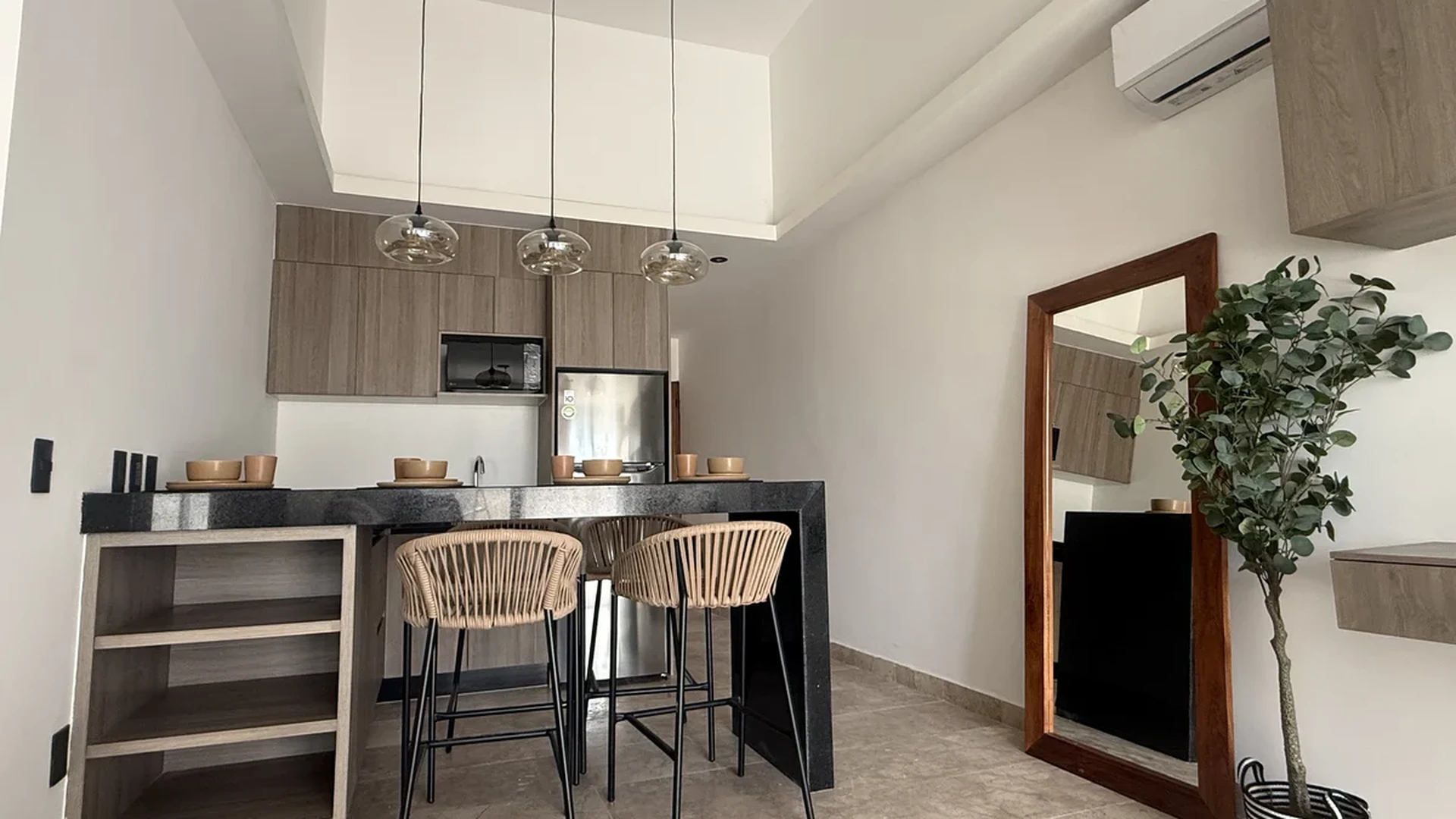 View of Kitchenette at iX, showcasing Breakfast Bar, Modern Design.