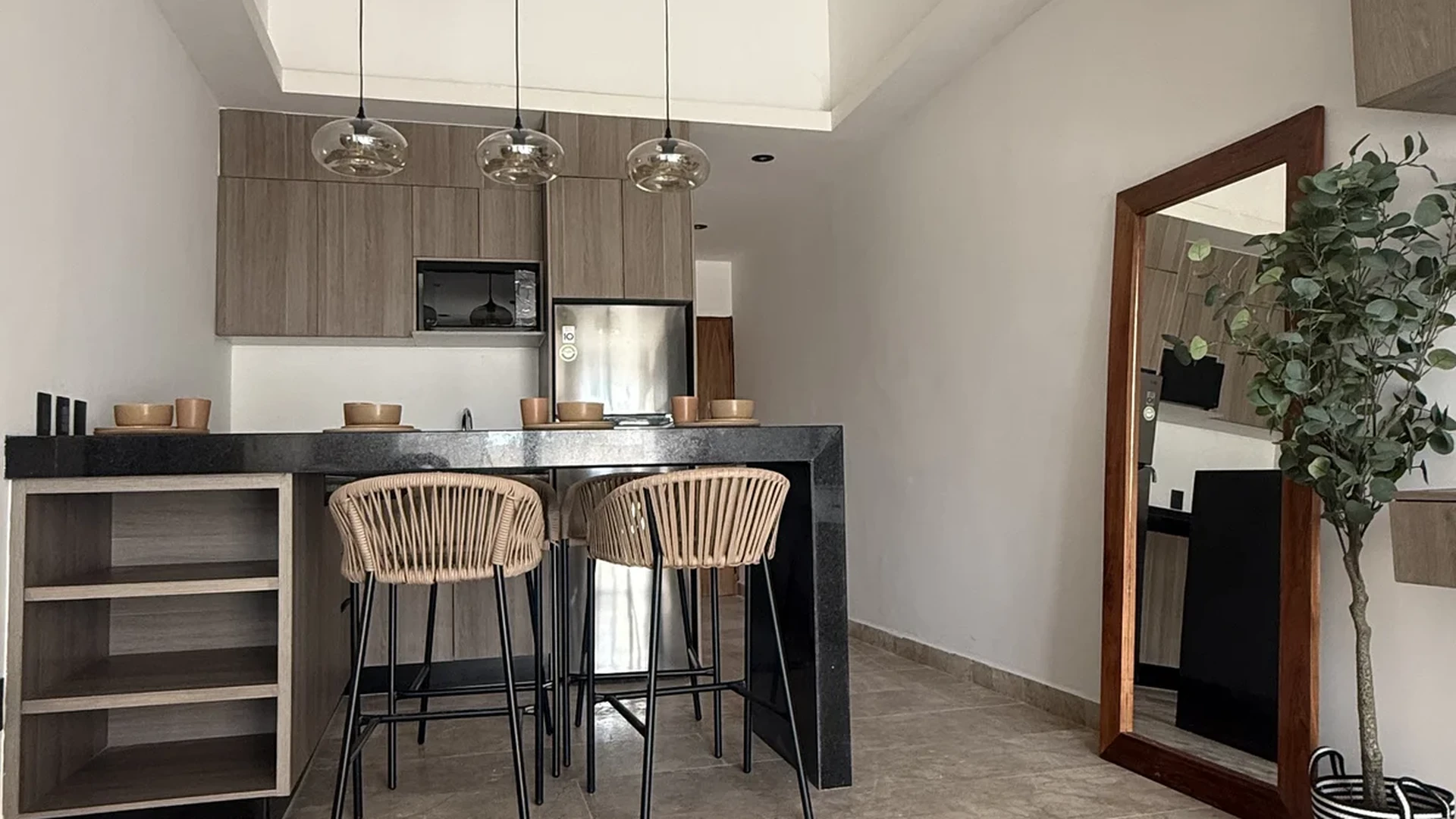 View of Modern Kitchenette at iX, showcasing Breakfast Bar, Open Concept.