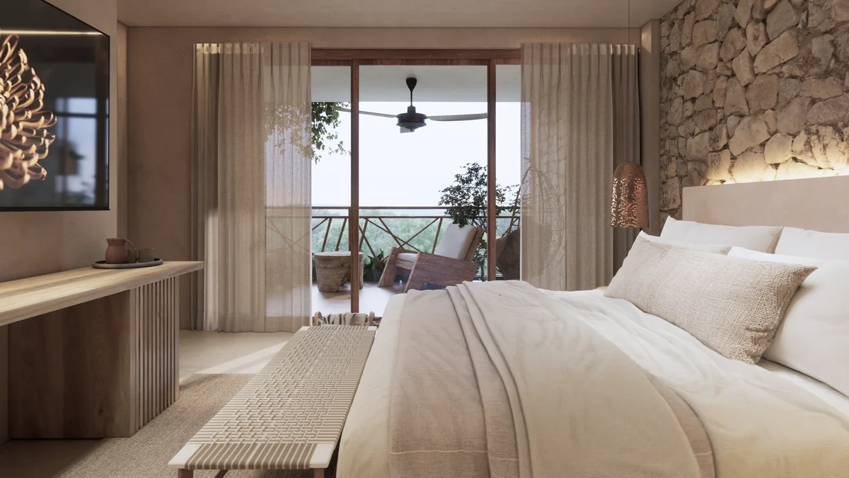 View of Luxury Bedroom at Ekab Tulum, showcasing Private Balcony, Stone Accent Wall.