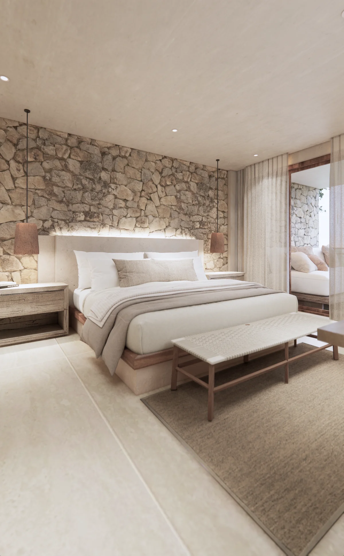 View of Master Bedroom at Ekab Tulum, showcasing Stone Accent Wall, Modern Rustic Decor.