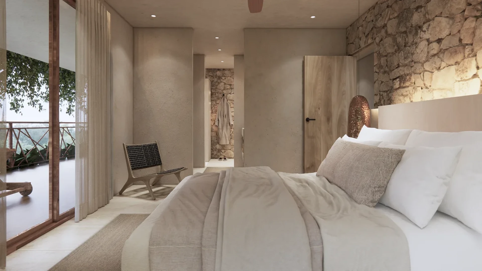 View of Master Bedroom at Ekab Tulum, showcasing Rustic Modern Design, Stone Accent Wall.