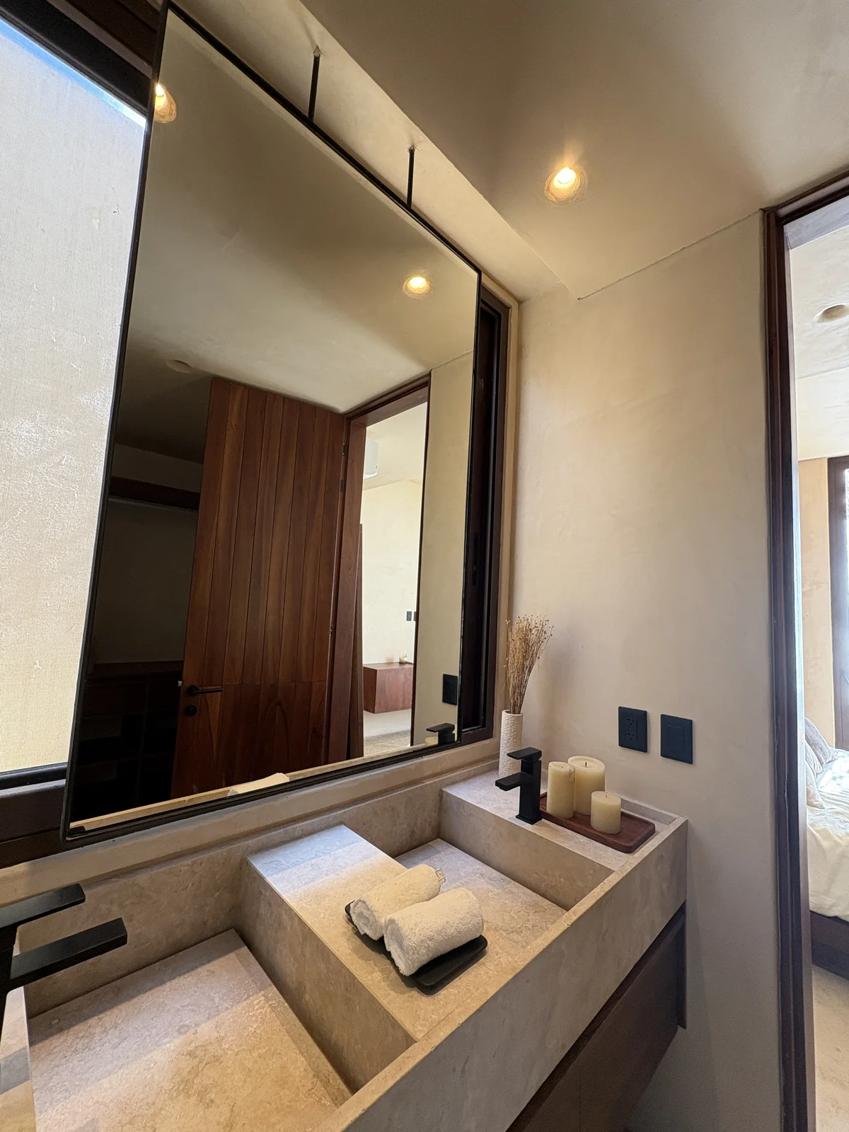 View of Modern Bathroom at Bahia, showcasing Double Vanity, Stone Sink.