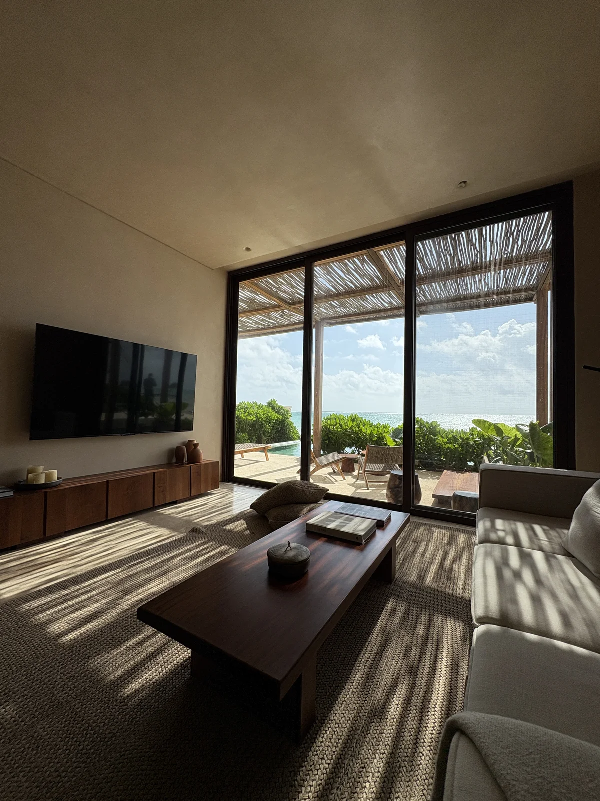 Image of Swimming Pool at Bahia, featuring Ocean View Living Room, Indoor-Outdoor Living.