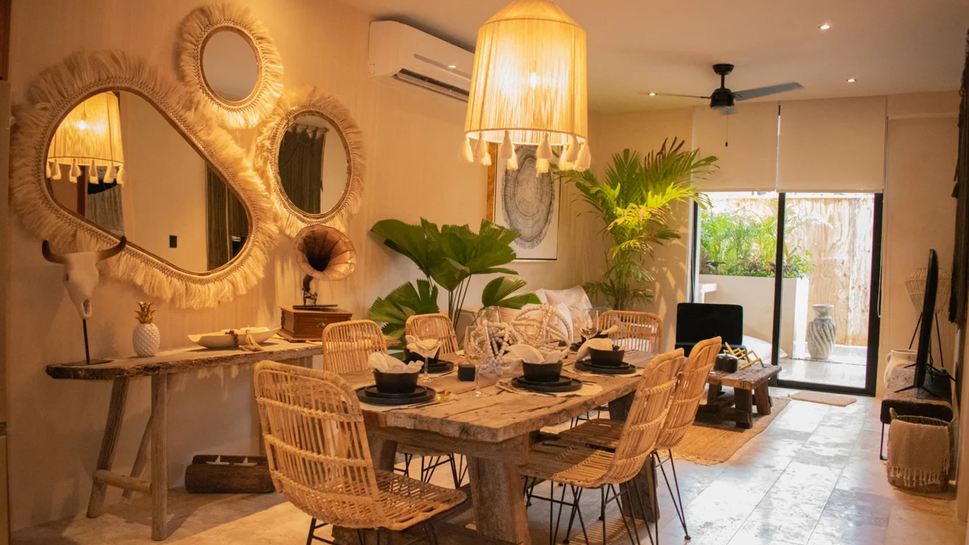 View of Bohemian Decor at Deja Vu, showcasing Rustic Dining Room, Open Concept Living.