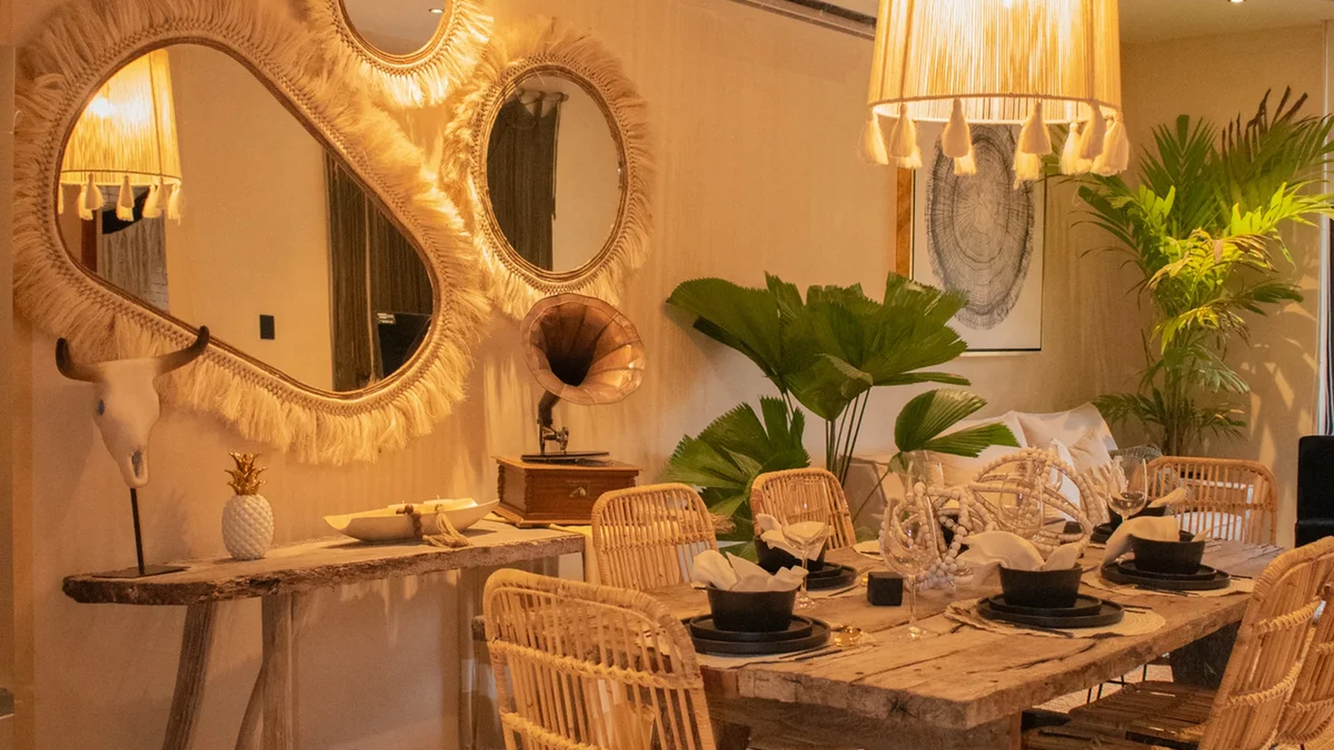 View of Bohemian Interior Design at Deja Vu, showcasing Rustic Dining Room, Wicker Dining Chairs.