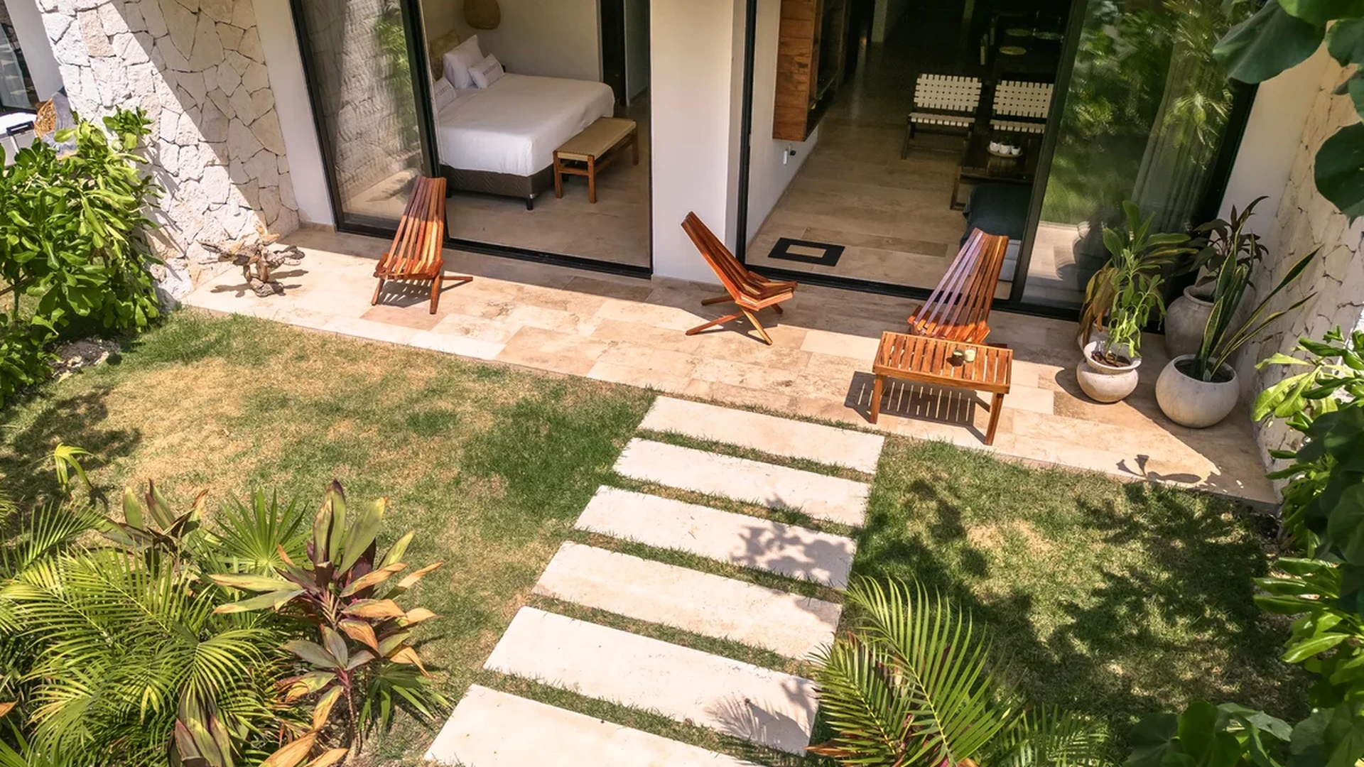 Image of Garden at Monarca, featuring Private Garden, Indoor-Outdoor Living.