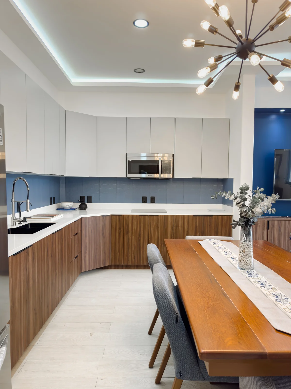 View of Modern Kitchen at Blue Water, showcasing Dining Area, Open Concept.
