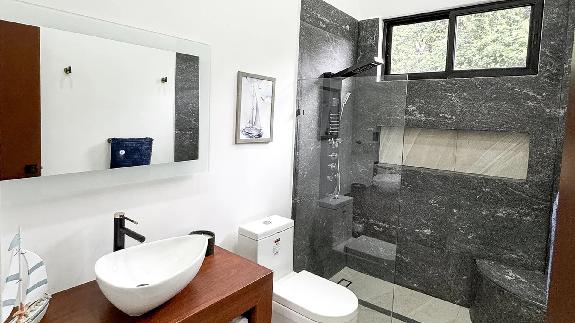 View of Modern Bathroom at Blue Water, showcasing Walk-in Shower, Vessel Sink.