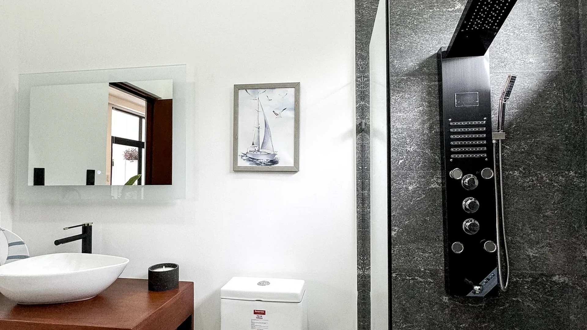 View of Modern Bathroom at Blue Water, showcasing Walk-in Shower, Rainfall Shower Head.