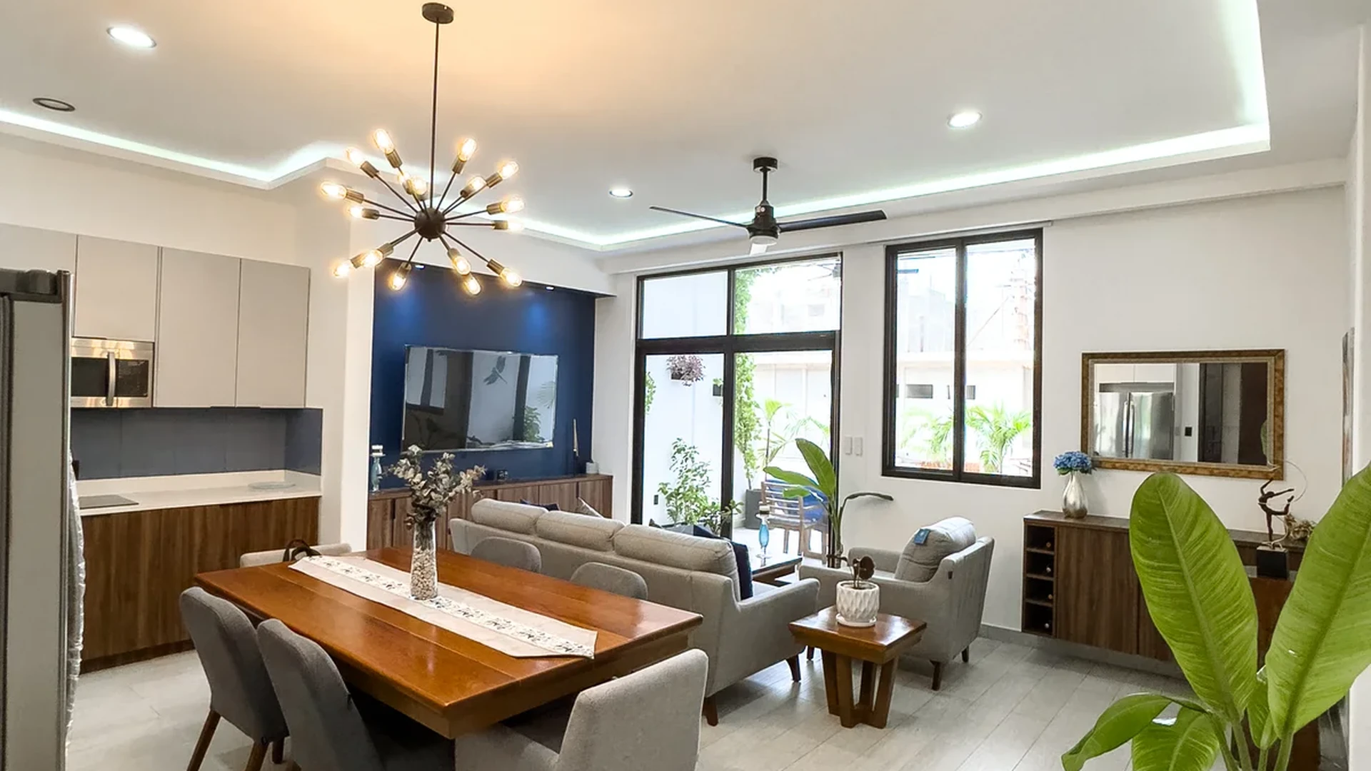 View of Open Concept Living at Blue Water, showcasing Modern Dining Room, Contemporary Design.