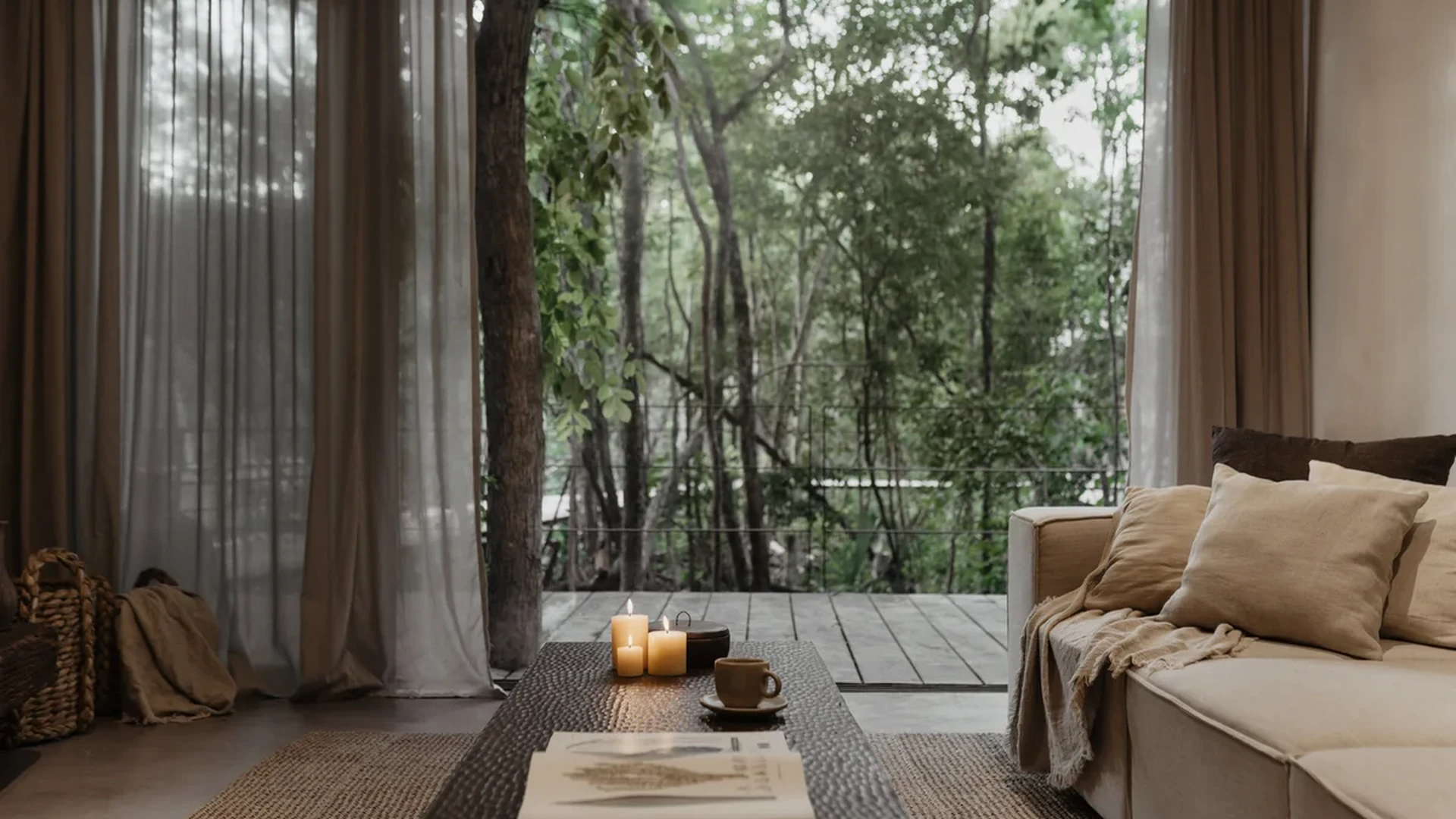 View of Living Room at Bodhi, showcasing Indoor-Outdoor Living, Jungle View.
