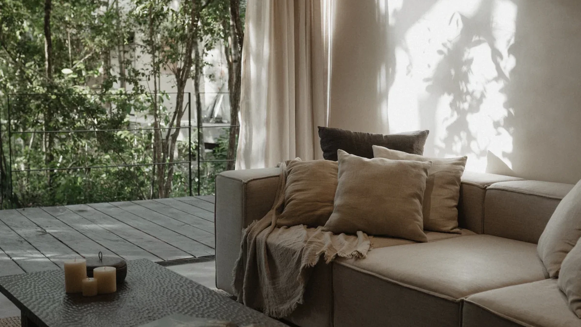 View of Living Room at Bodhi, showcasing Natural Light, Indoor-Outdoor Living.