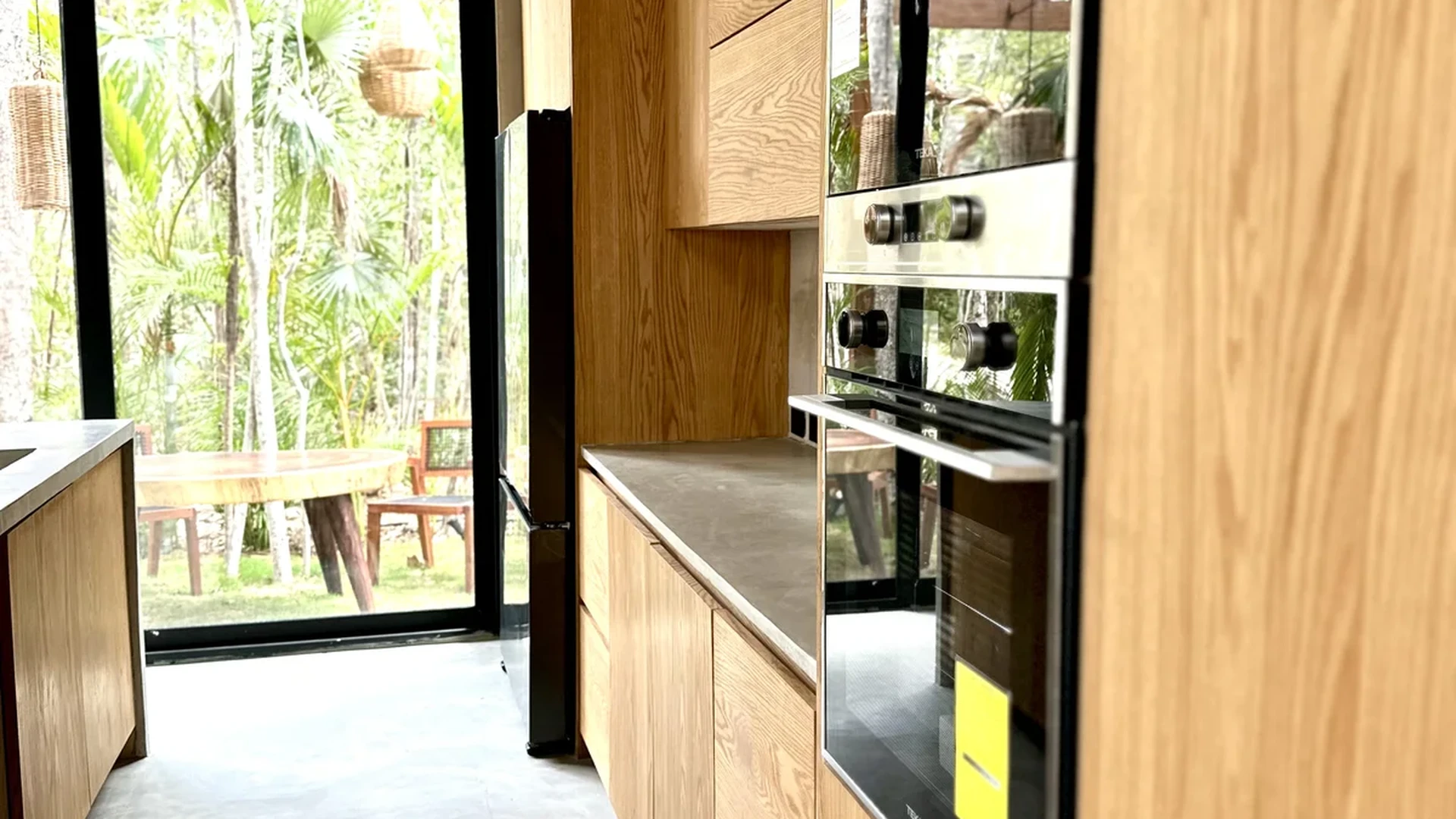 Image of Garden at Xanbel, featuring Modern Kitchen, Wood Cabinetry.