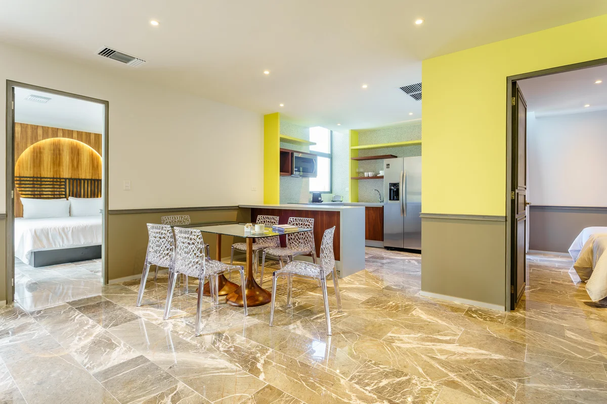 View of Open Concept Living at Singular Joy, showcasing Marble Flooring, Dining Area.