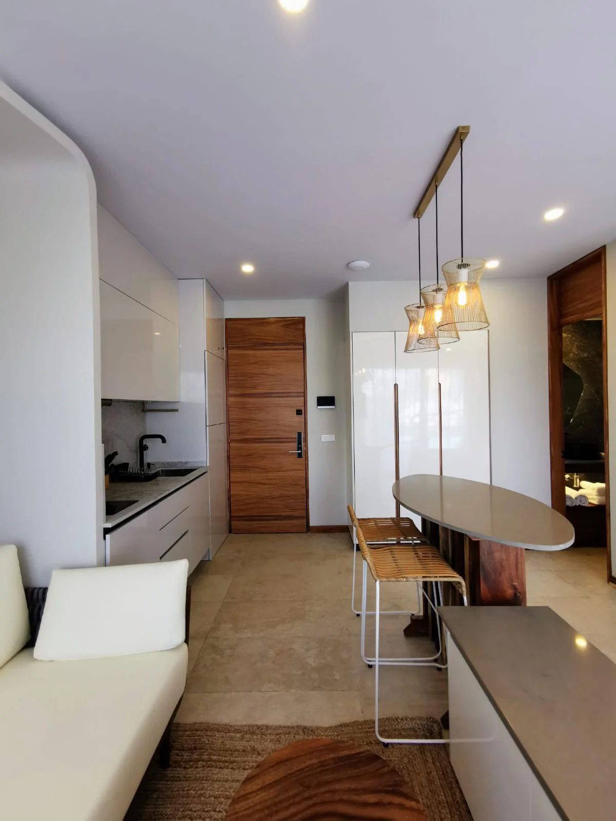 View of Modern Kitchen at Alizee, showcasing Open Concept Living, Studio Apartment.