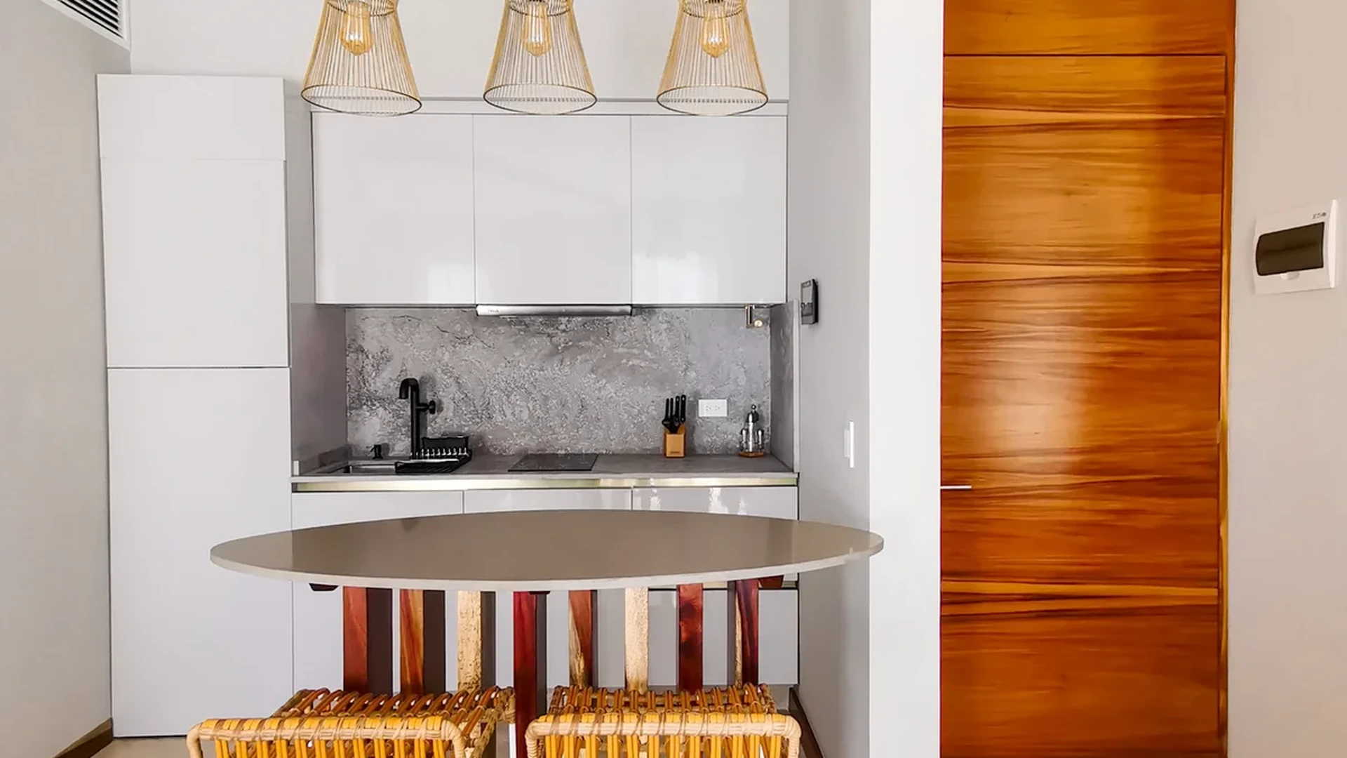 View of Modern Kitchenette at Alizee, showcasing Breakfast Bar, Pendant Lighting.