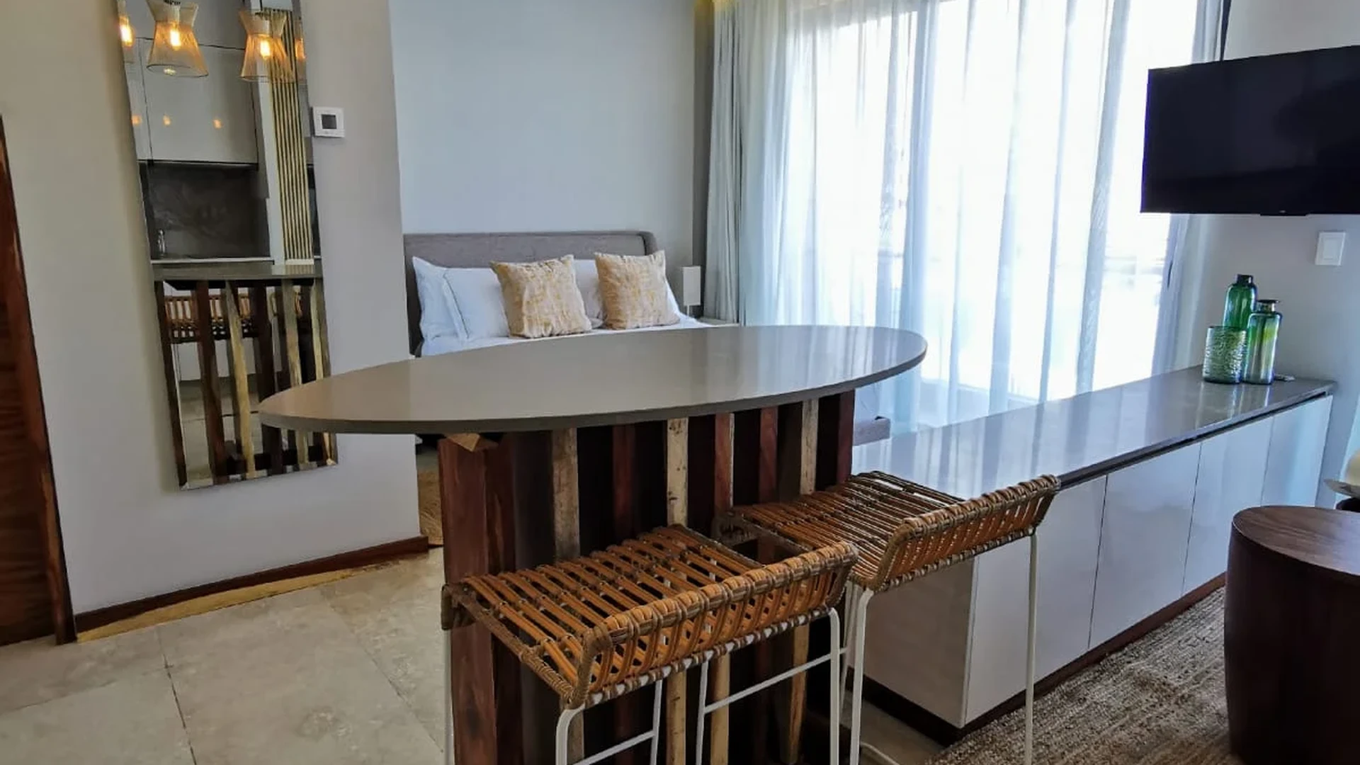 View of Studio Apartment at Alizee, showcasing Modern Interior Design, Breakfast Bar.