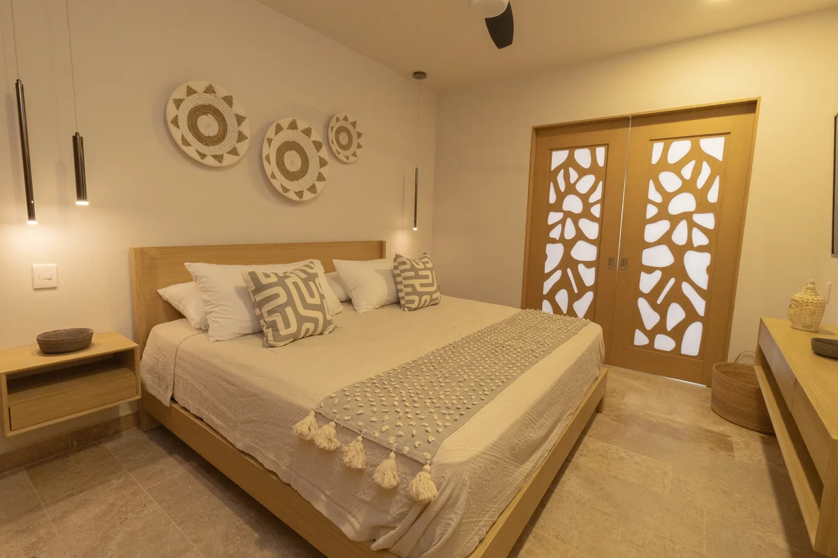 View of Bedroom at Vibbe, showcasing Modern Decor, Natural Wood Furniture.
