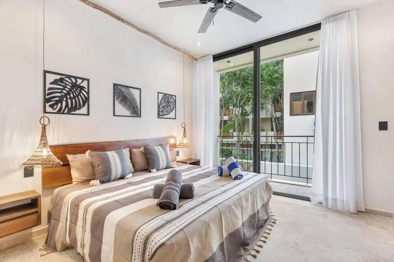 View of Bedroom at Sands Tulum, showcasing King Size Bed, Private Balcony.