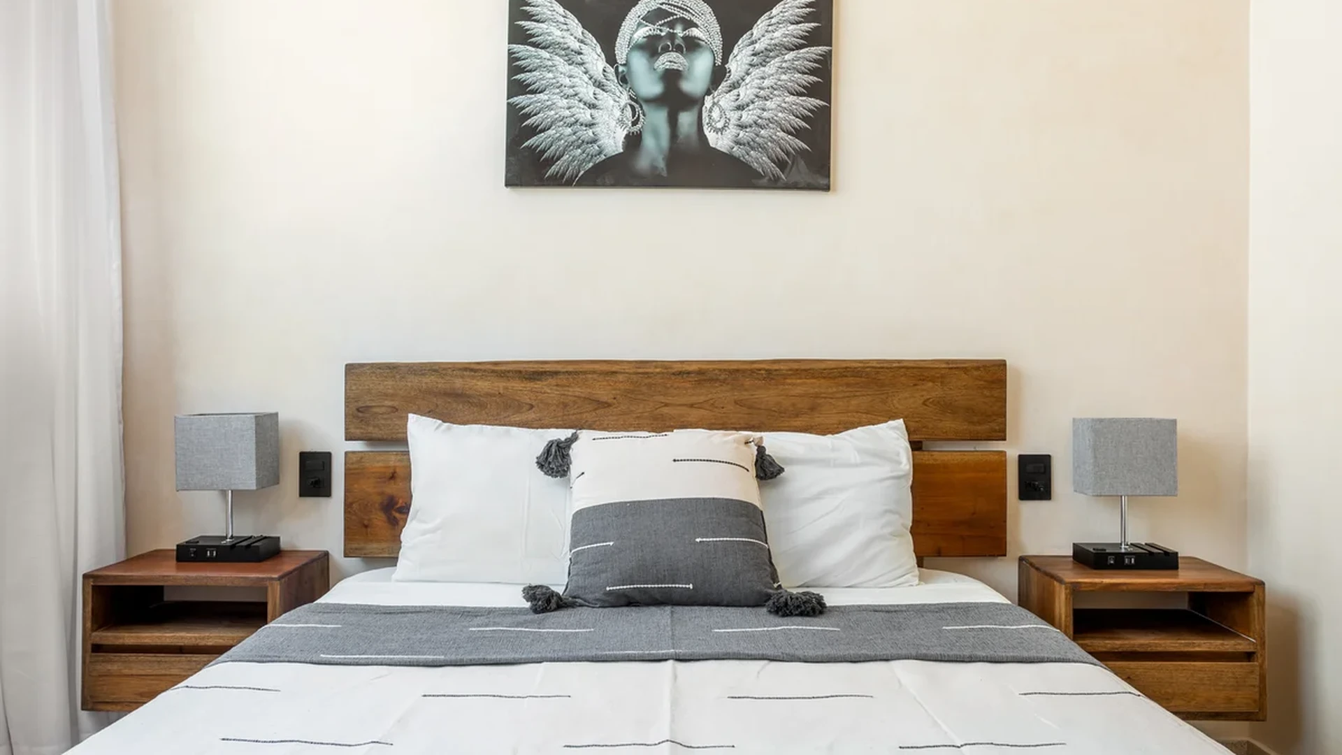 View of Bedroom at Sands Tulum, showcasing Modern Bedroom, Wood Headboard.