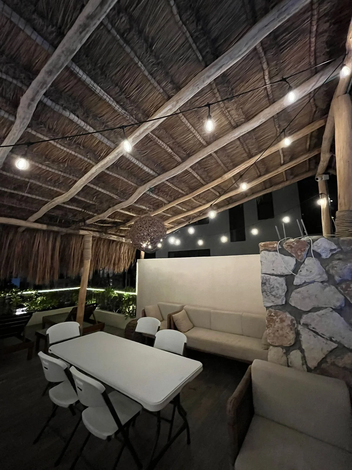 Image of Lounge at Sands Tulum, featuring Outdoor lounge, Palapa roof.