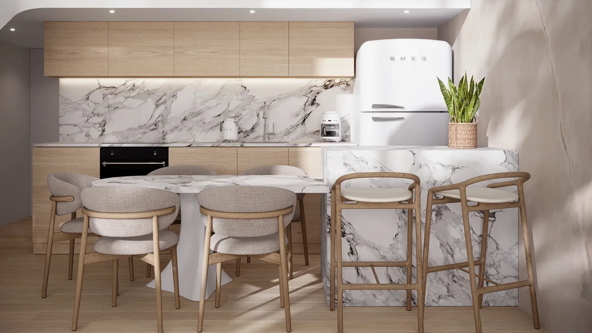 View of Modern Kitchen at Luna, showcasing Marble Countertops, Wood Cabinetry.