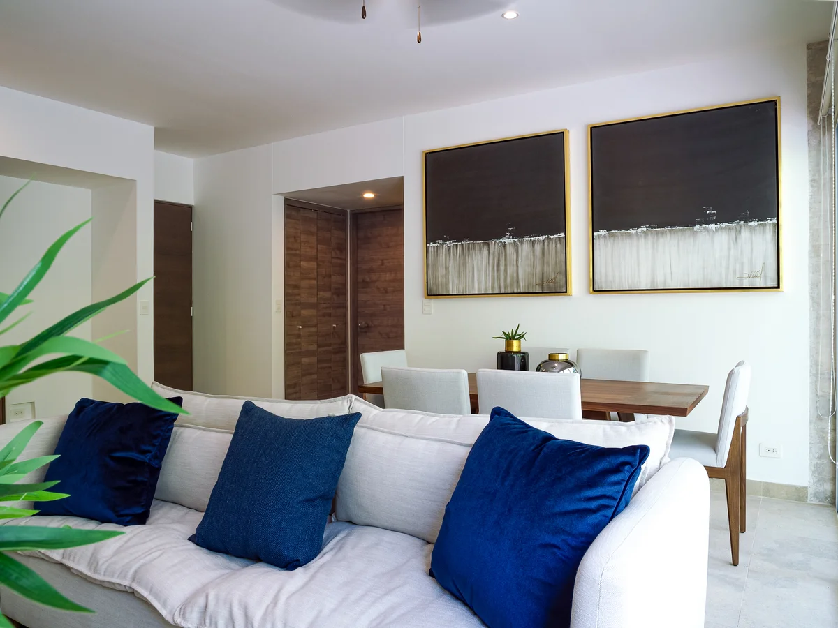View of Living Room at Tao Tulum, showcasing Dining Area, Modern Interior.