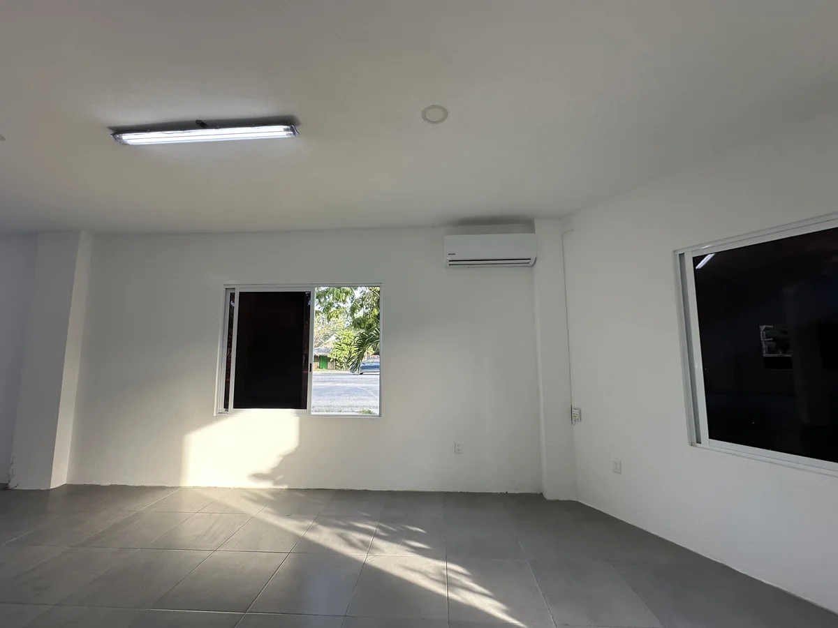 View of Unfurnished Room at Triángulo, showcasing White Interior, Tile Flooring.