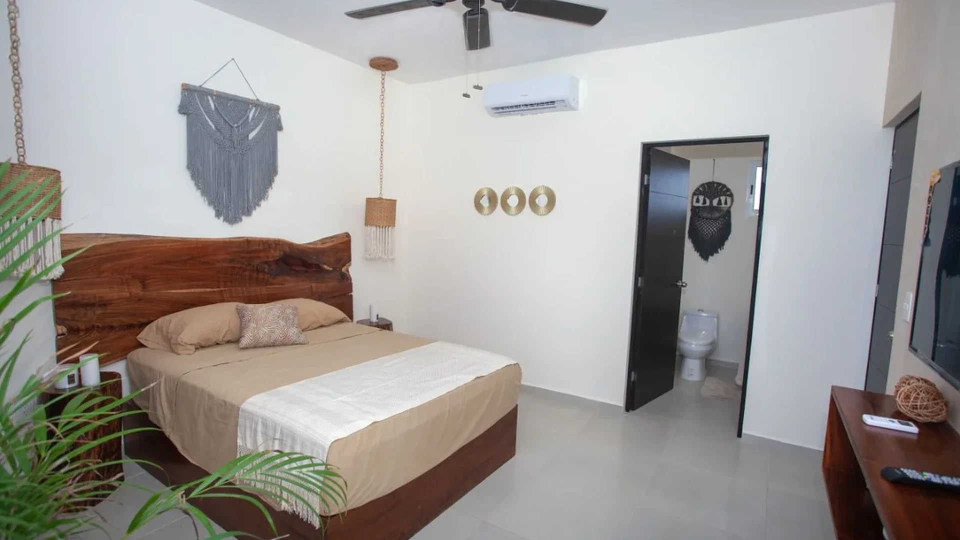 View of Bedroom at Triángulo, showcasing Modern Bedroom, Wood Headboard.