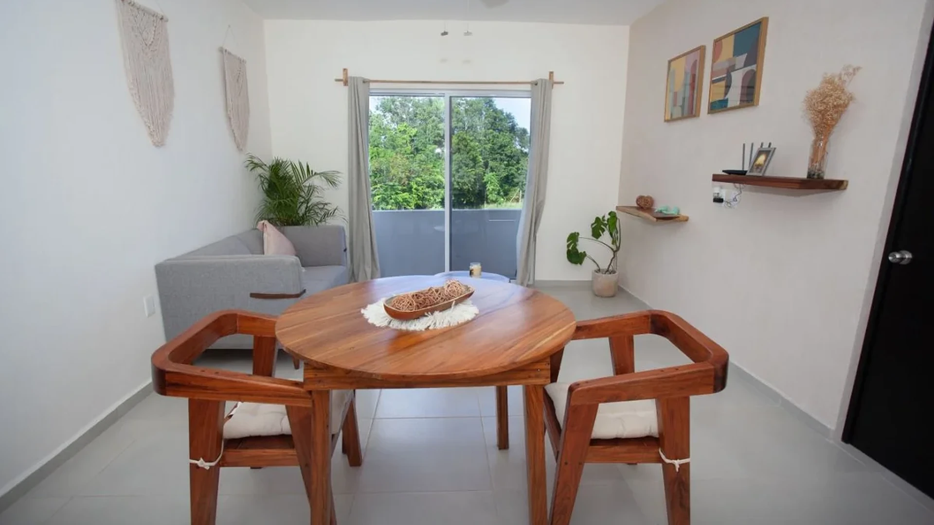 View of Dining Area at Triángulo, showcasing Living Space, Modern Decor.