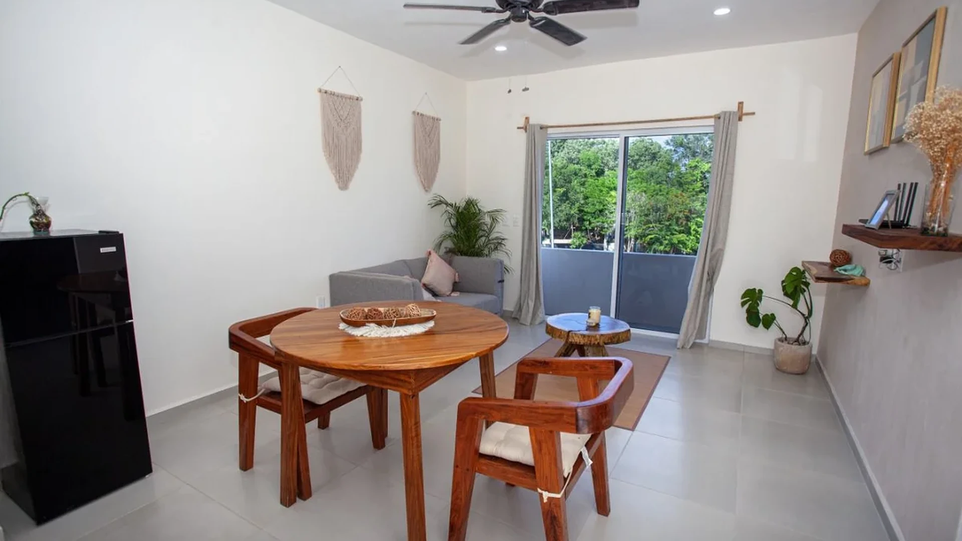 View of Modern Living Room at Triángulo, showcasing Dining Area, Open Concept.